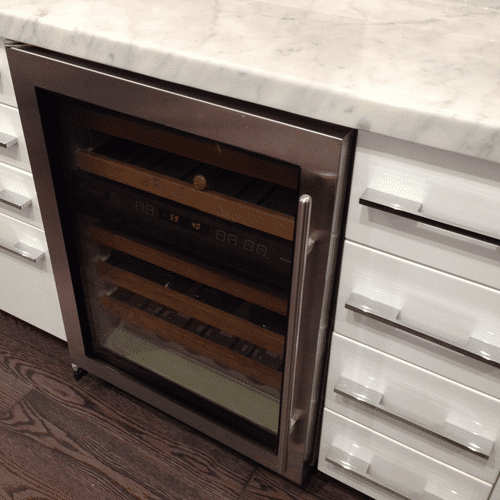 subzero-wine-cabinet-installed-in-white-kitchen