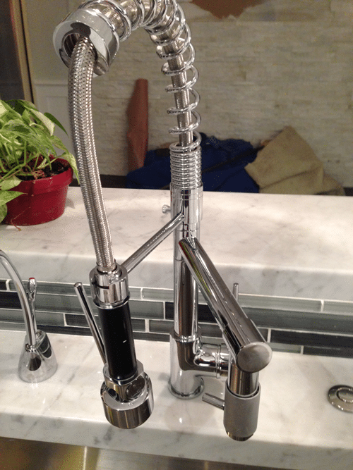 pro-style-kitchen-faucet-in-white-kitchen