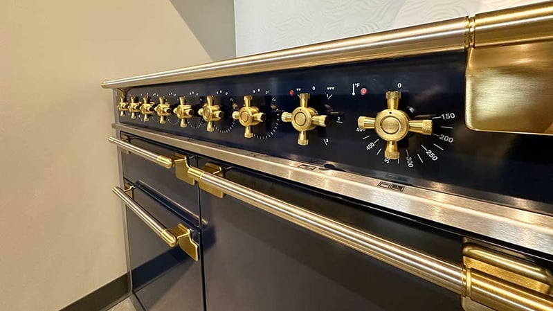 AGA-Elise-48-Inch-Range-with-Smaller-Oven-and-Brass-Knobs-at-Yale-Appliance-in-Norton