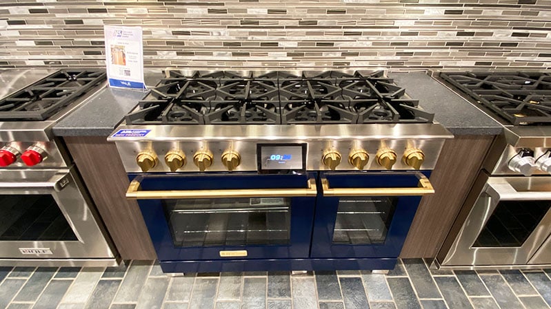 BlueStar-Dual-Fuel-Range-in-Blue-with-Brushed-Brass-Hardware