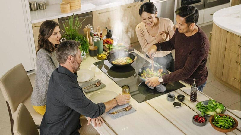 Thermador-induction-cooktop-installed-and-family-gathering