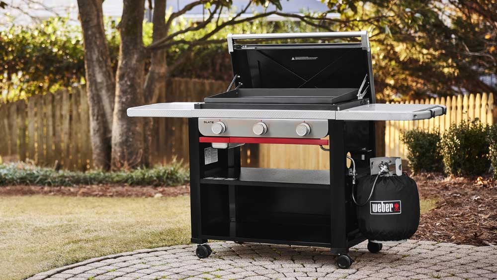 Weber-Slate-Outdoor-Freestanding-Griddle-on-patio