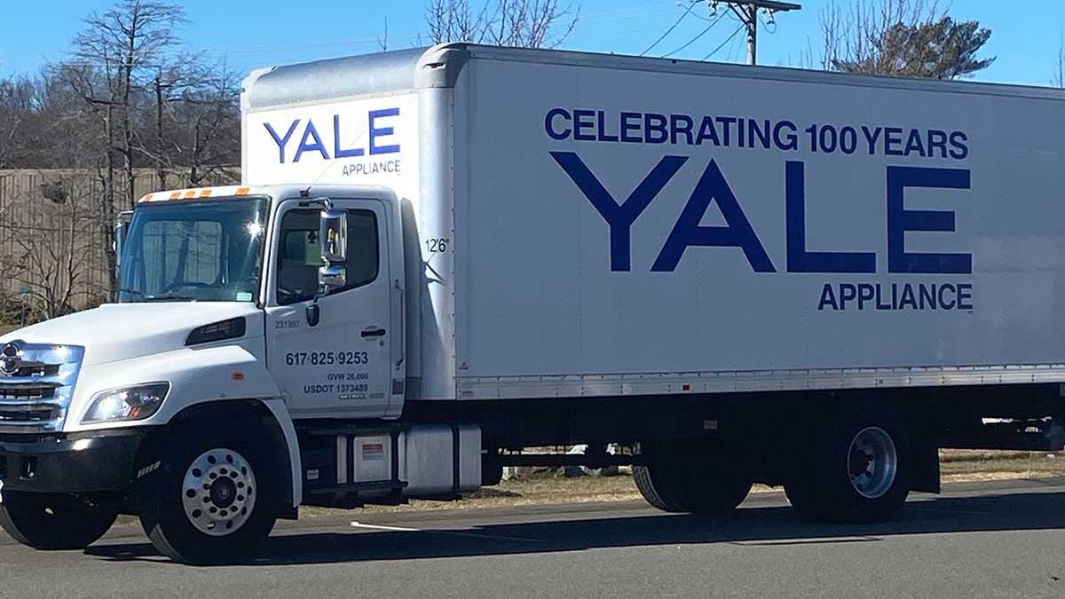 Yale Appliance delivery truck arriving at a customer’s home in Massachusetts